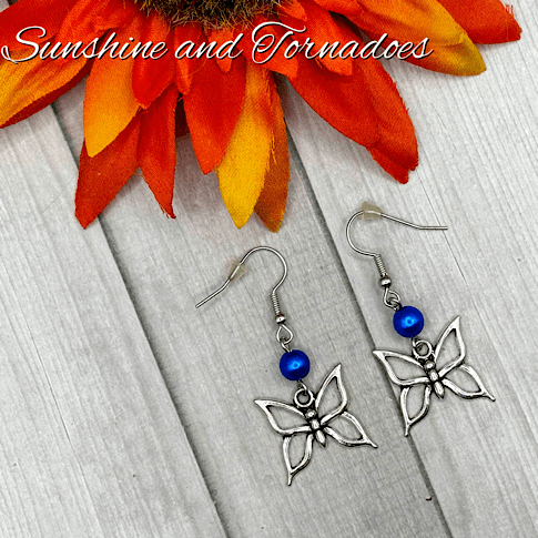 Handmade Silver Butterfly Charm Earrings with Blue Pearl Beads - Image 7