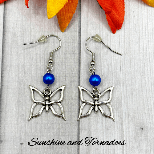Handmade Silver Butterfly Charm Earrings with Blue Pearl Beads - Image 6