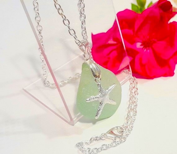 Green sea glass with silver starfish charm silver plated chain. slightly chunky piece