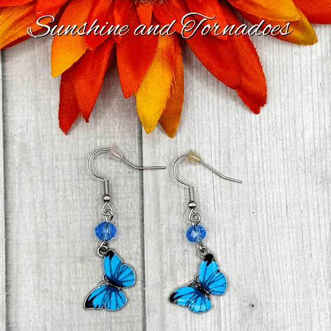 Handmade Blue Enamelled Silver Butterfly Drop Earrings with Pale Blue Faceted Glass Beads. - Image 6