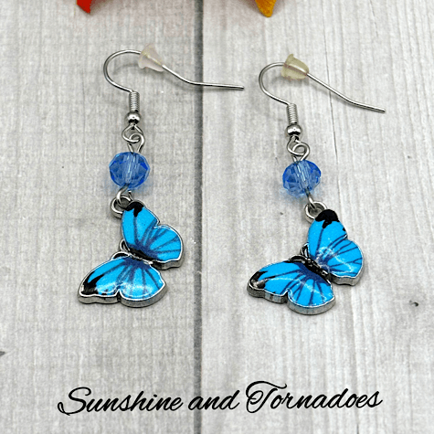 Handmade Blue Enamelled Silver Butterfly Drop Earrings with Pale Blue Faceted Glass Beads. - Image 7