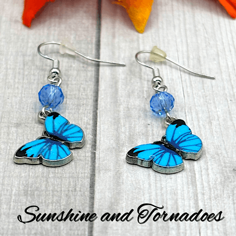 Handmade Blue Enamelled Silver Butterfly Drop Earrings with Pale Blue Faceted Glass Beads. - Image 5