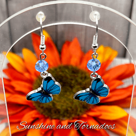 Handmade Blue Enamelled Silver Butterfly Drop Earrings with Pale Blue Faceted Glass Beads. - Image 3