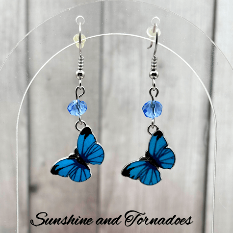 Handmade Blue Enamelled Silver Butterfly Drop Earrings with Pale Blue Faceted Glass Beads. - Image 2