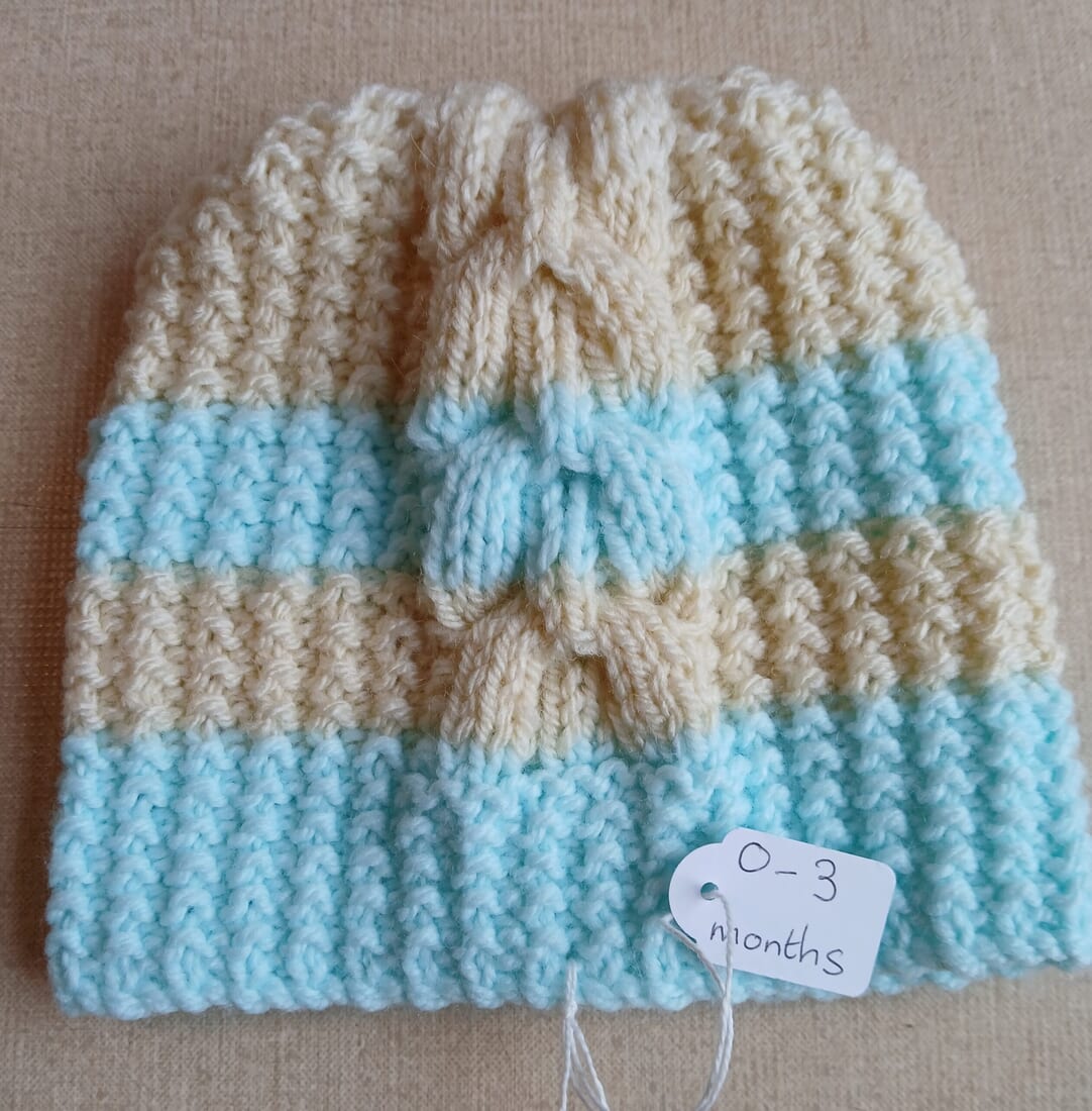 Handknitted baby beanie. 0 to 3 months. All proceeds to The Stroke Association