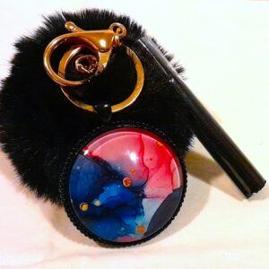 Black fluffy pom pom with large round water colour charm keyring multicolour