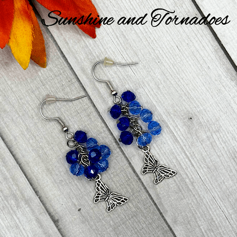 Handmade Silver Butterfly Drop Earrings with Blue Faceted Glass Bead Cluster. - Image 4
