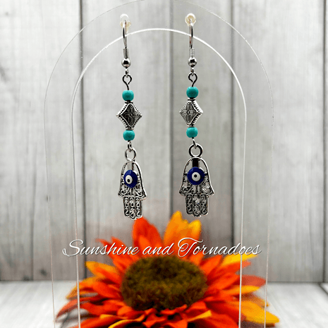 Handmade Drop Earrings with Silver Evil Eye Hamsa Charms and Turquoise Howlite Gemstone Beads. - Image 7