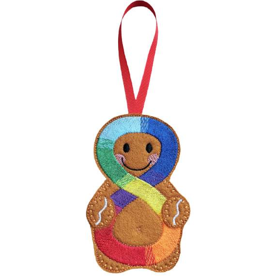 Handmade felt Neurodiversity Awareness Gingerbread Character with smiling face and colourful rainbow infinity symbol, completed with a red hanging ribbon.