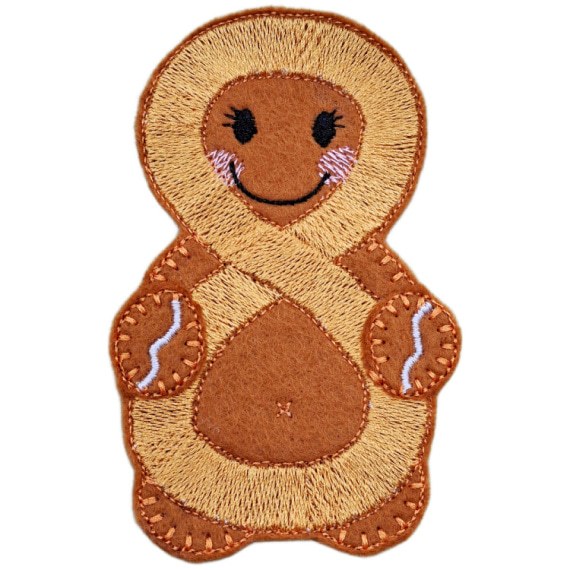 Handmade felt Neurodiversity Awareness Gingerbread Character with gold infinity symbol, smiling face, pink cheeks, and stitched eyelashes, representing autism awareness.