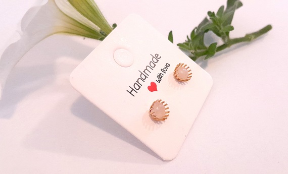 Rose quartz flower studs tiny 5mm studs in 18k gold plated flower cup alt view