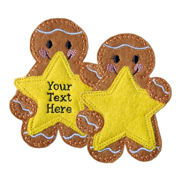 Handmade felt gingerbread character holding a yellow star, smiling face and stitched details. Both gingerbreads are holding yellow stars. The star on the one on the right is blank, where the one held by the gingerbread on the left shows 'Your text here'