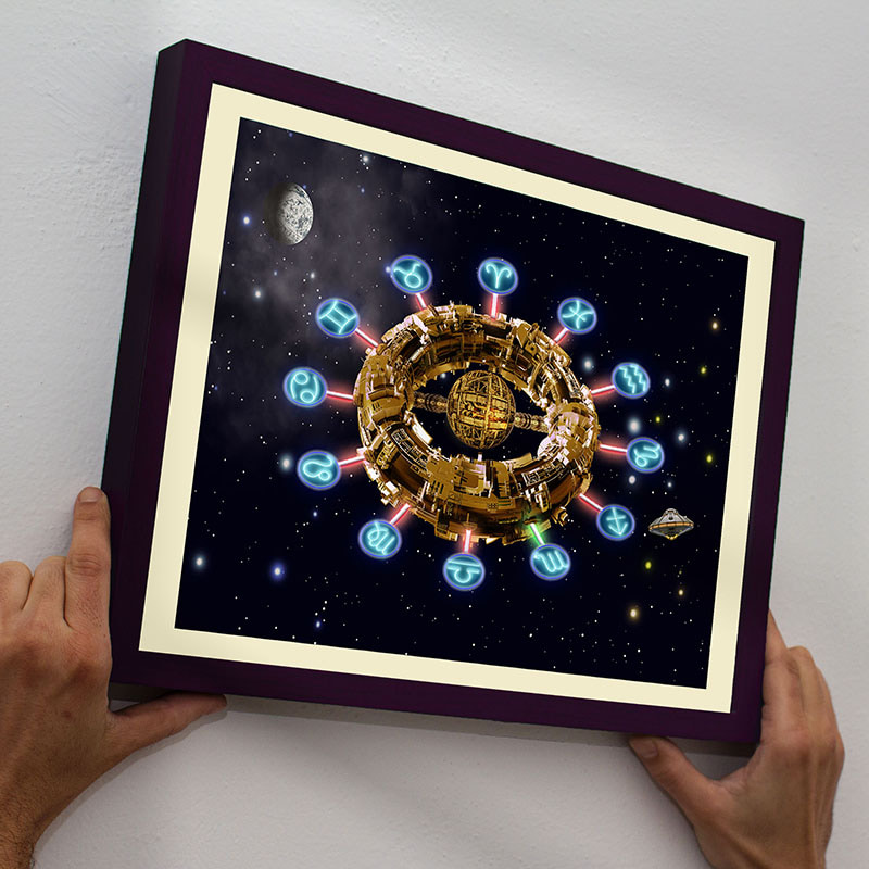 Starry Skies Space Station print held against wall
