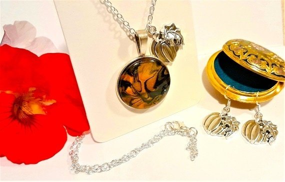 hand painted fluid art pumpkin pendant necklace fluid art abstract black bronze orange 25mm nickel free tray