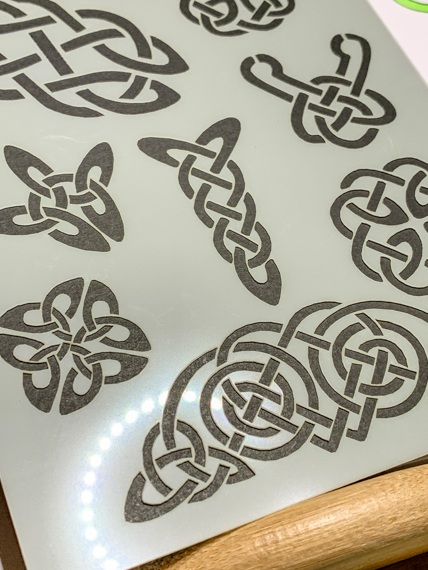 Celtic Knots Design 3 Journal Stencil - A close up of the bottom of the stencil showing multiple knots.
