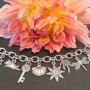 Antique silver charm bracelet with toggle clasp