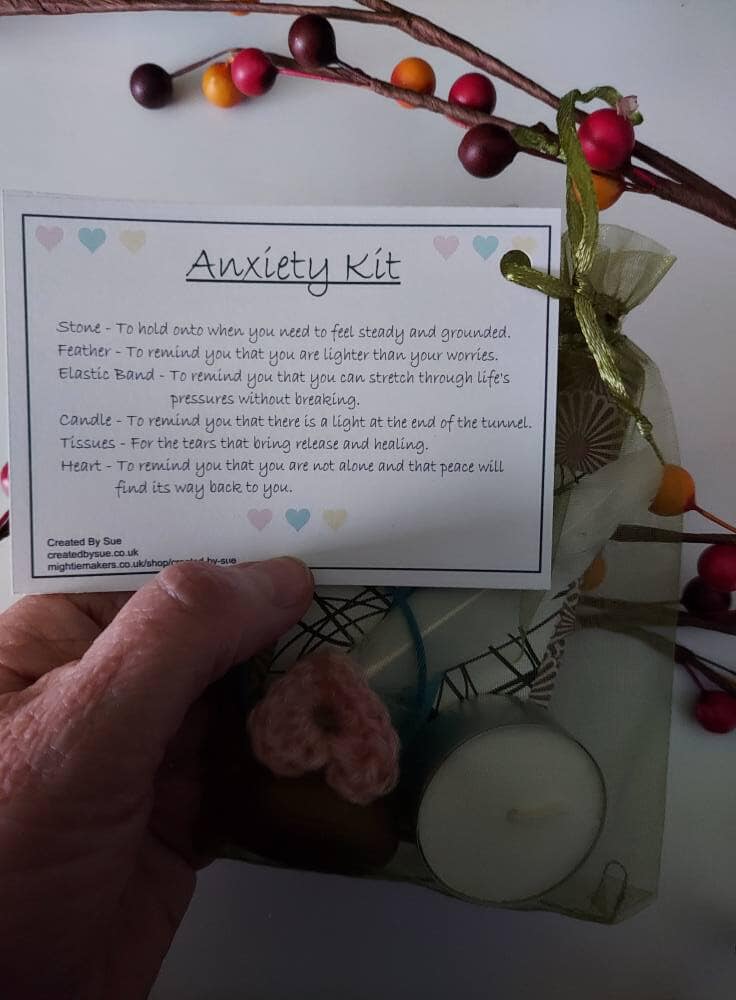 Pic shows green organza bag with contents for Anxiety Kit