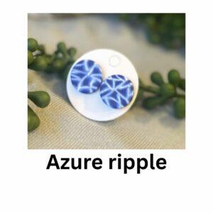 Azure Ripple stud earrings in deep blue marbled polymer clay, handmade in Sheffield by Lollygag Jewellery and displayed on a white card.