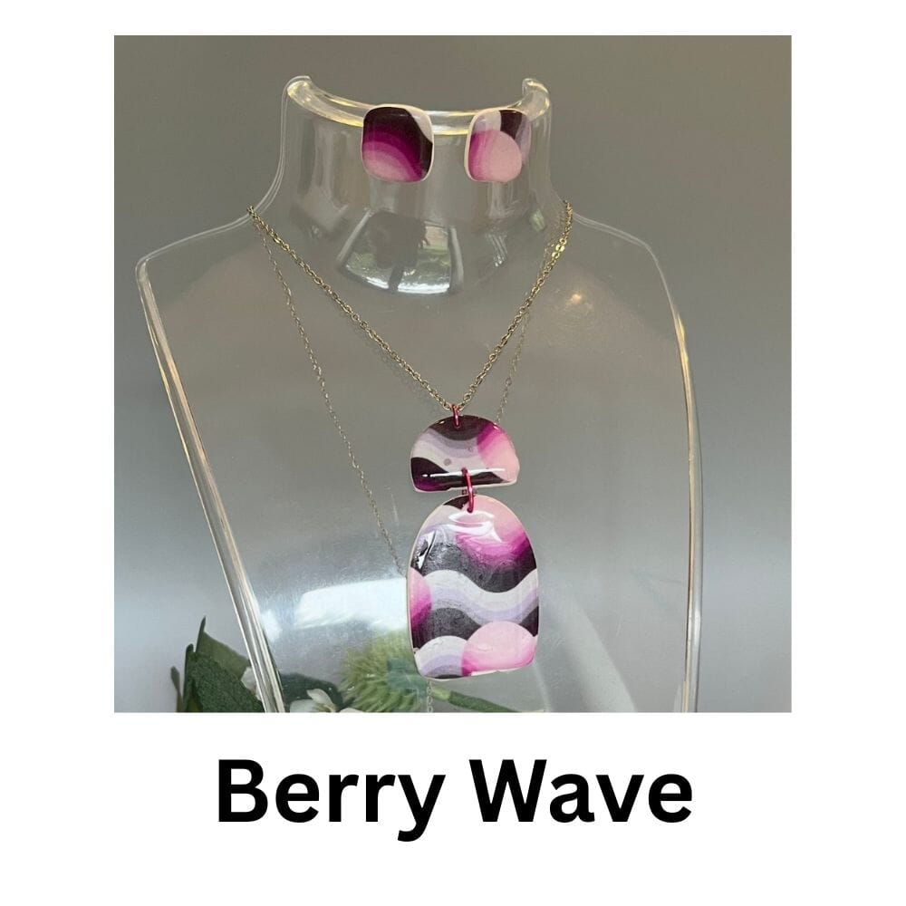 Berry Wave vintage wallpaper necklace and stud earring set with magenta, lilac and black curved stripe pattern, handmade polymer clay jewellery by Lollygag Sheffield.