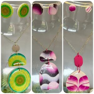 Vintage Revive Collection handmade necklace and stud earring sets made from mid-century vintage wallpaper, including Citrus Bloom, Berry Wave and Pink Petal designs by Lollygag Sheffield.