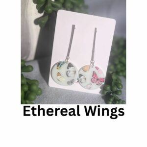 Ethereal Wings polymer clay earrings with translucent round drops featuring butterflies, shells, and pastel tones, suspended from silver-tone bar studs, handmade in Sheffield.