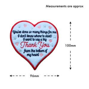 Heart-shaped felt hanging decoration shown with approximate measurements. The heart measures around 100 mm in height and 96 mm in width.
