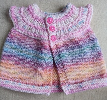 Handknitted baby cardigan. Approx 0 to 3 months. All proceeds to The Stroke Association