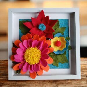 Three dimensional felt flower arrangement in a frame. All proceeds to The Stroke Association