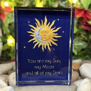 Sun and Moon Romance block on pebbles closeup