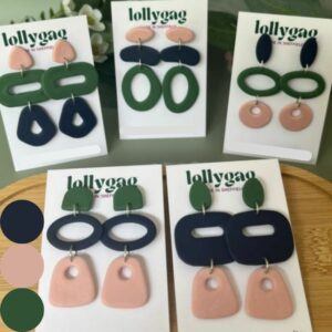 1940s inspired polymer clay earrings in blush pink, navy blue, and military green, handmade in Sheffield by Lollygag, celebrating resilience, vintage design, and dopamine dressing.