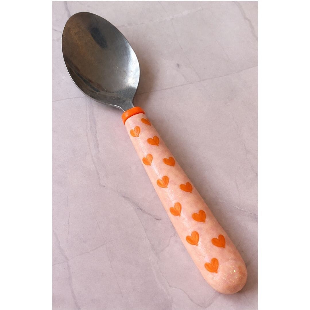 Handmade polymer clay handled spoon with peach and orange heart pattern, Moments of Love limited edition Valentine’s Day gift by Lollygag Sheffield