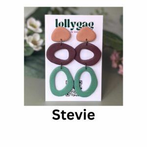 Stevie handmade polymer clay earrings in terracotta, deep plum and avocado green, inspired by 1970s rock style and bohemian fashion