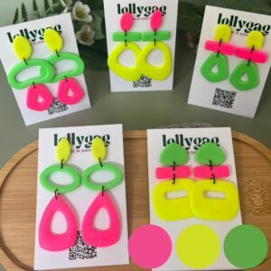Group photo of handmade polymer clay statement earrings in neon yellow, lime green and hot pink from the 1980s Decade Collection by Lollygag, inspired by dopamine dressing and handmade in Sheffield