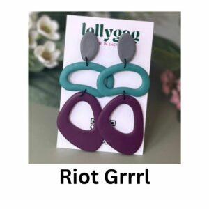 Riot Grrrl handmade polymer clay statement earrings in teal, grape purple and industrial grey, inspired by 1990s feminist punk and grunge fashion
