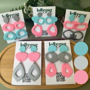 Group photo of handmade polymer clay statement earrings in baby blue, bubblegum pink and silver grey from the 2000s Decade Collection by Lollygag, inspired by Y2K nostalgia and handmade in Sheffield