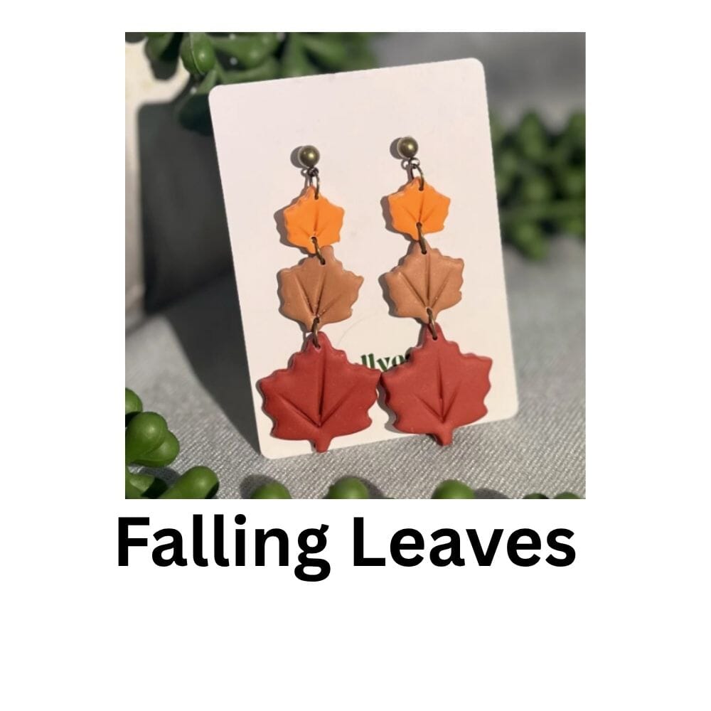Falling Leaves earrings handmade from polymer clay with cascading maple leaf shapes in red, orange and ochre tones, autumn jewellery by Lollygag Sheffield.