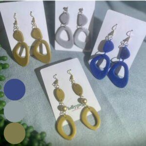 Contour Collection sculptural polymer clay earrings by Lollygag Jewellery featuring silver, gold and blue minimalist cut-out designs, handmade in Sheffield