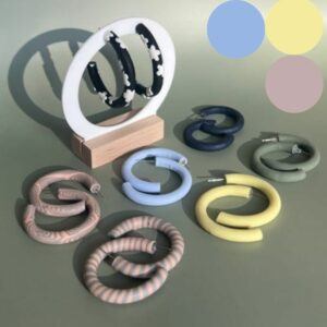 The Loopscape Collection transforms classic hoop earrings into joyful, custom-made statements. Handmade in Sheffield using lightweight polymer clay, these hoops are designed for comfort, creativity and confidence. Choose your colour, pattern and size to create earrings that reflect your mood, personality and style. Inspired by the dopamine dressing movement, Loopscape hoops celebrate expressive jewellery that feels good to wear. Whether you prefer calm neutrals, pastel swirls, playful stripes, bold hearts or retro florals, each pair is made to order with care and attention to detail. Perfect for everyday wear, gifting or festival styling, Loopscape hoops combine slow fashion values with modern, feel-good design.