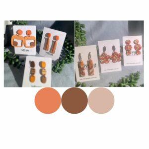 The Groove Collection handmade polymer clay earrings in orange, brown and cream tones arranged together on display cards, retro 1970s inspired jewellery handmade in Sheffield
