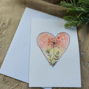 sunset and flowers in heart blank greeting card