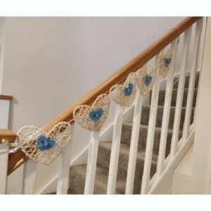 Off White Rattan Hearts Bunting, with blue felt hearts and blue satin roses