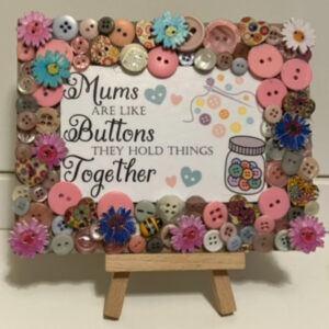 “Mums are like Buttons..” quote encased in a Beautiful Button Embellished Keepsake Plaque (6”x5”) with small wooden display easel.