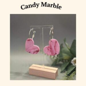 Candy Marble Hearts handmade pink polymer clay heart earrings with marbled detail, hanging on silver hooks, lightweight joyful jewellery by a disabled UK maker.