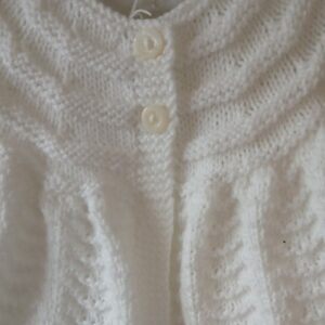 Handknitted white baby cardigan. Approx 0 to 3 months. All proceeds to The Stroke Association
