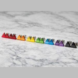 Rainbow triangle stud earrings in red orange yellow green blue purple grey and black, gender neutral geometric polymer clay studs inspired by dopamine dressing jewellery