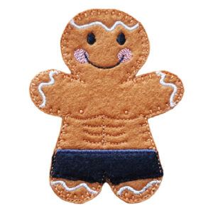 Felt gingerbread bodybuilder character with stitched abs, smiling face, and black gym-style shorts.