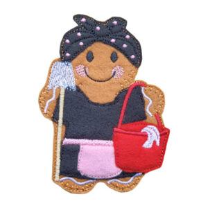 A felt gingerbread character dressed as a cleaner, holding a mop in one hand and a red cleaning bucket in the other, with embroidered details and a polka-dot headscarf.
