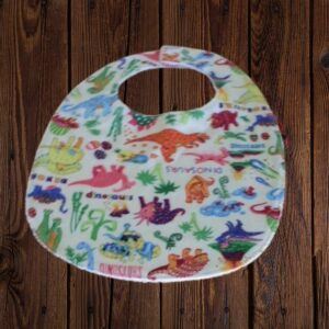 Dinosaur Bib view 2, 100% cotton front and 100% white cotton towelling backing
