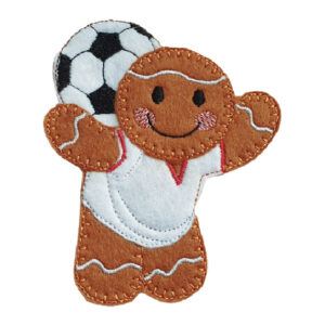 A felt gingerbread football player character wearing a white shirt and shorts, smiling and balancing a black and white football behind their head in a neck stall pose.