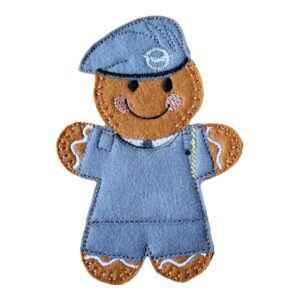 RAF Air Cadet Gingerbread Character, handmade from soft felt, dressed in RAF Cadet uniform with beret and embroidered badge, featuring detailed stitching and cheerful expression.